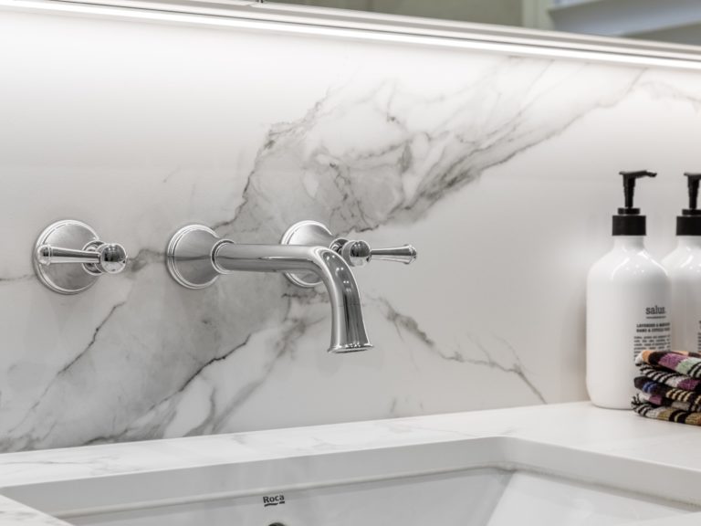 Marble splashback and faucet